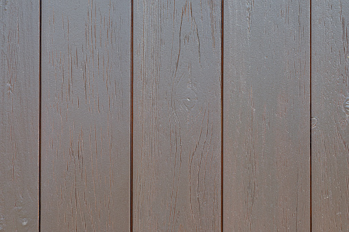 Horizontal photograhy of dark stained wood texture, abstract backgrounds with blank copy space ready for design, taken in close-up full frame. Low contrast image, for inspiration, simplicity, tranquility and sparse concepts.