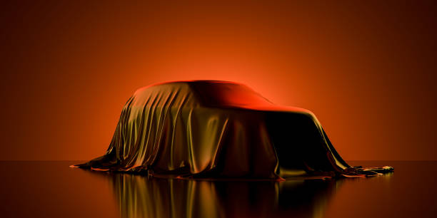 Presentation Of Luxury Car Covered With Cloth on Dark Illuminated By Orange Neon Light Background. 3d rendering stock photo