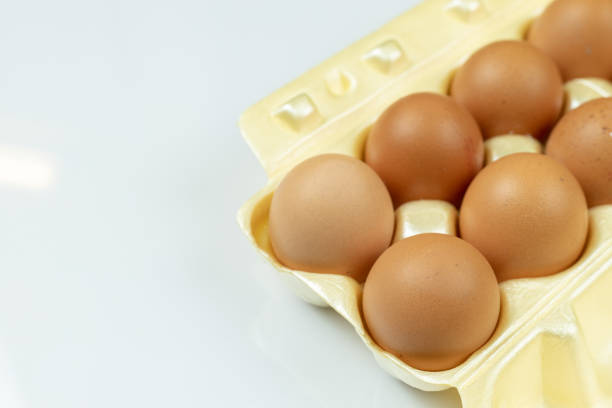 istock Full box with eggs isolated above white background with copy space 1214574616