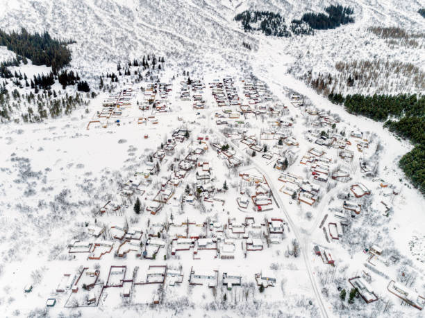 istock Aireal of trailer park, mobile home during winter. 1214574774