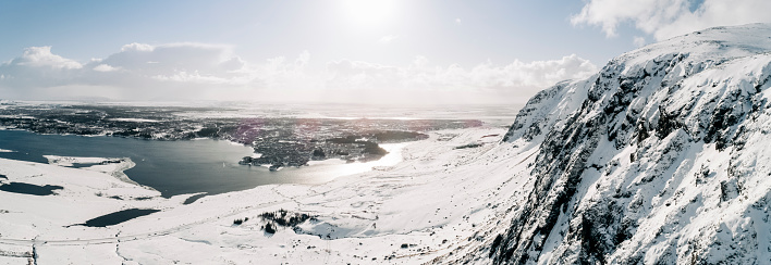View of a beautiful nature covered in snow on a sunny winter’s day in Iceland
