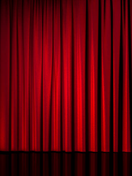 istock Illuminated By Spotlight Red Curtains And Blue Floor. Modern Showcase with Empty Space. 3d rendering. Copy space. 1214575400