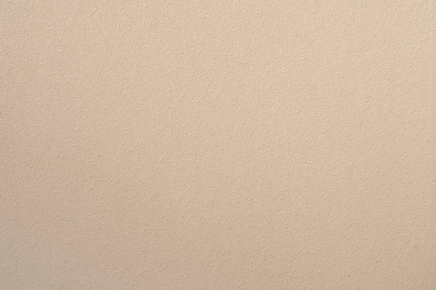 Horizontal photograhy of a beige wood texture, with wood grain and knot abstract backgrounds with blank copy space ready for design, taken in close-up full frame. Low contrast image, for inspiration, simplicity, tranquility and sparse concepts.