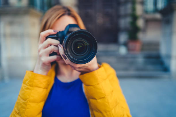 istock Photographer is taking photos with camera 1214578145