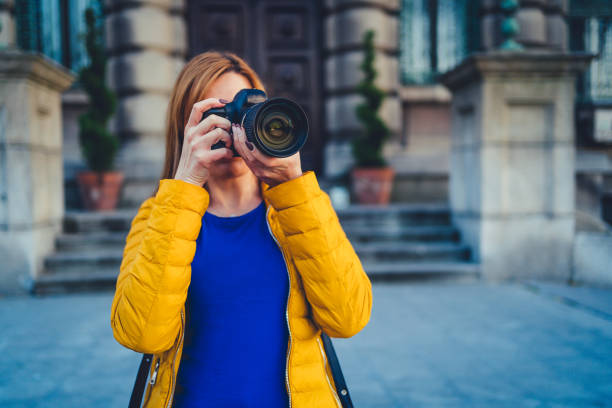 istock Photographer is taking photos with camera 1214579206