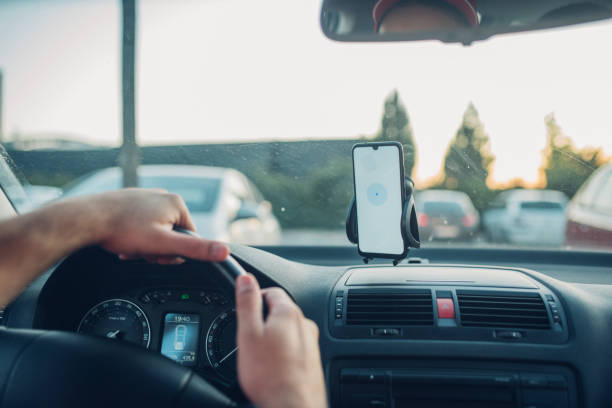 istock Delivery man using GPS on his smart phone 1214587799