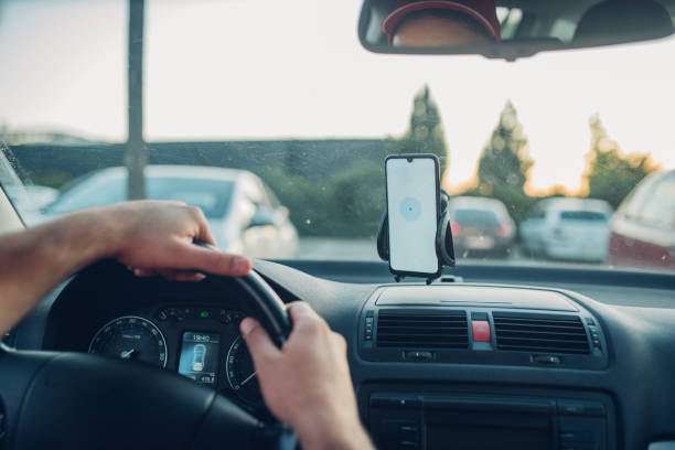 istock Delivery man using GPS on his smart phone 1214587863