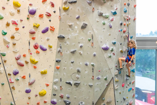 istock Child Indoor Rock Climbing 1214589643