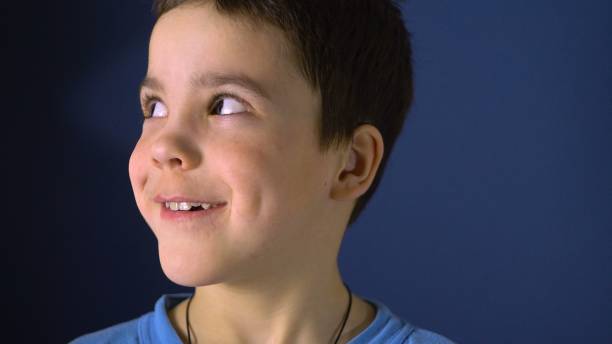 istock Close-up. Female hands wipe boy's face 1214589902