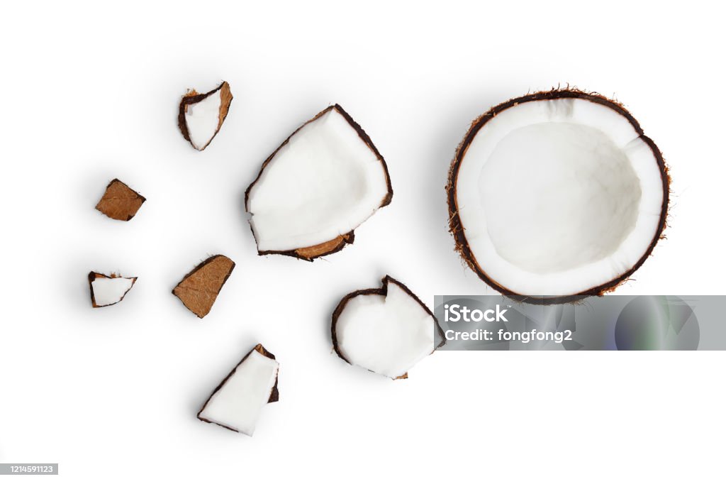 Whole coconut and pieces of coconut on white background Coconut Stock Photo
