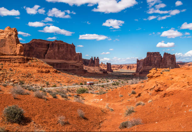 istock Bus Driving Through Arches National Park 1214594090