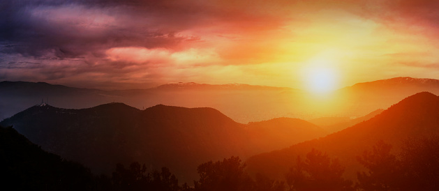 Sunrise over the mountains of İzmir, Turkey. This picture has taken at Balcova Terapi Forest.
