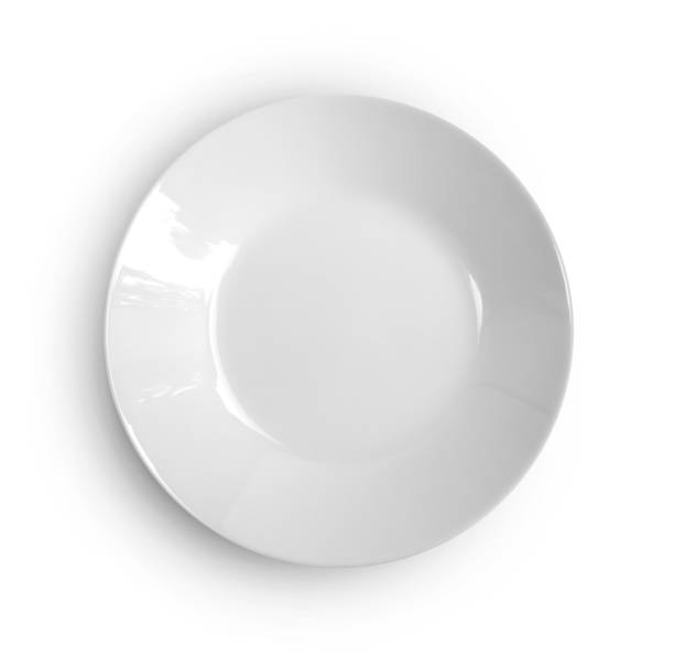 istock Top view of round plate or dish isolated on white 1214599033