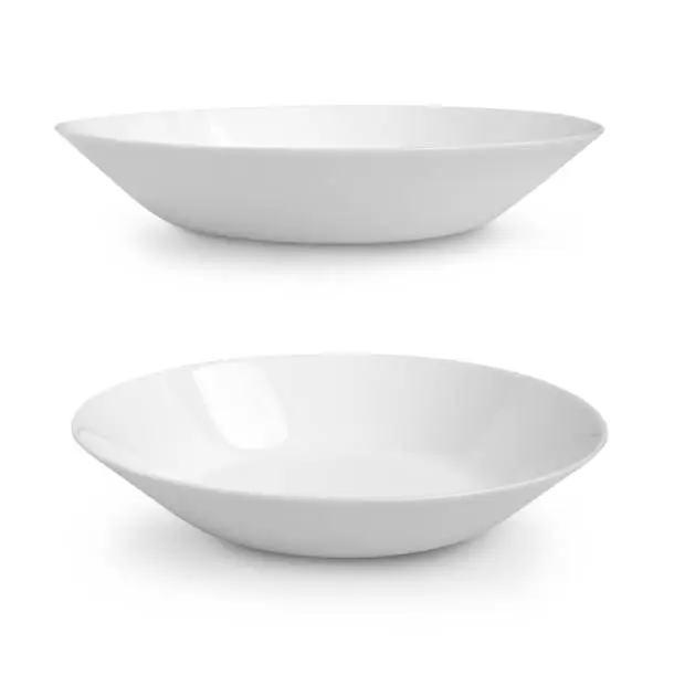 Side view of round plate or dish isolated on white with clipping path