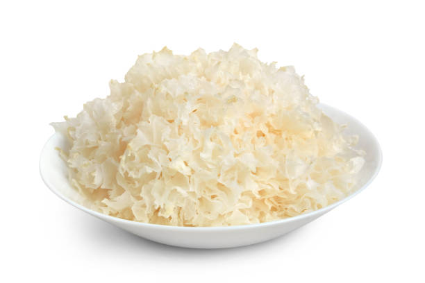 Snow fungus on plate isolated on white background