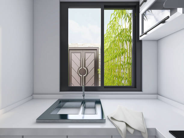 istock 3D rendering,Modern family kitchen design, new cabinets and kitchenware with refrigerators, sunlight from the window. 1214604523