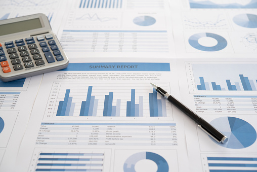 Data Analysis. Pen with business report on financial advisor desk. Concept of business planning , accounting, analysis, business analysis,financial services,financial planning,