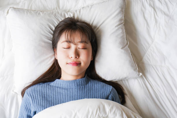istock Young woman going to bed 1214623285