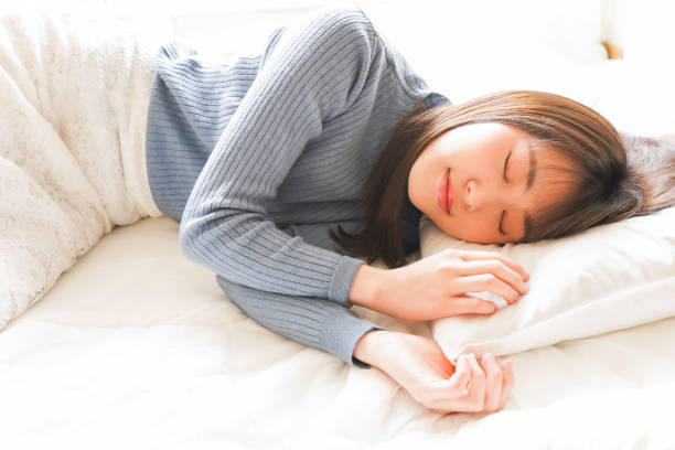 istock Young woman going to bed 1214623324