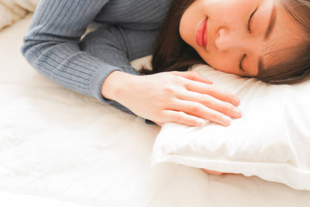 istock Young woman going to bed 1214623869