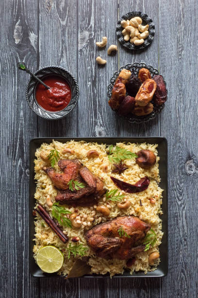 istock Arabic traditional food bowls Kabsa with meat 1214624328