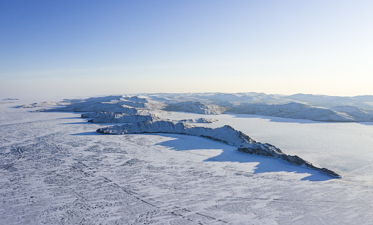 Serial view of frozen Olkhon island during winter. Lake Baikal, Siberia, Russia.