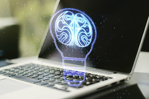 istock Double exposure of creative light bulb hologram with human brain on laptop background, idea and brainstorming concept 1214626996