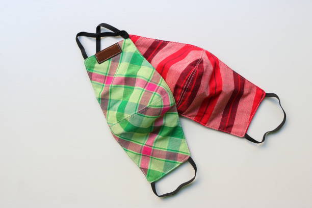 Two washable plaid cloth face mask stock photo