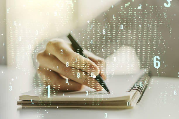 istock Multi exposure of abstract programming language hologram with world map and man hand writing in notepad on background, artificial intelligence and neural networks concept 1214627252