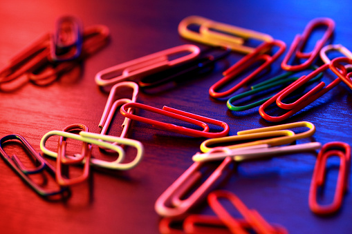 Close up of colorful paper clips.