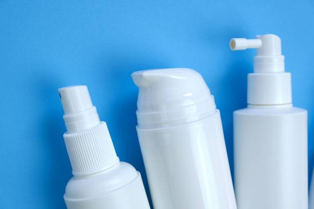 istock Disinfectant Bottle Set. Hand disinfection. White plastic bottles on a blue background. Hygiene and health concept. Hygiene during the epidemic of coronavirus.Cosmetic bottles Mockup. 1214630491