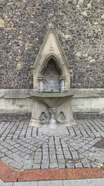 istock Rustic drinking fountain for man and beast in Reading town center, England 1214633698