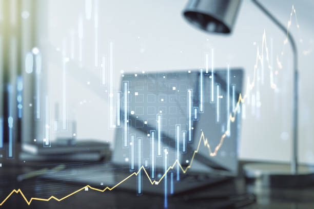 istock Double exposure of abstract creative financial chart on modern laptop background, research and strategy concept 1214633782