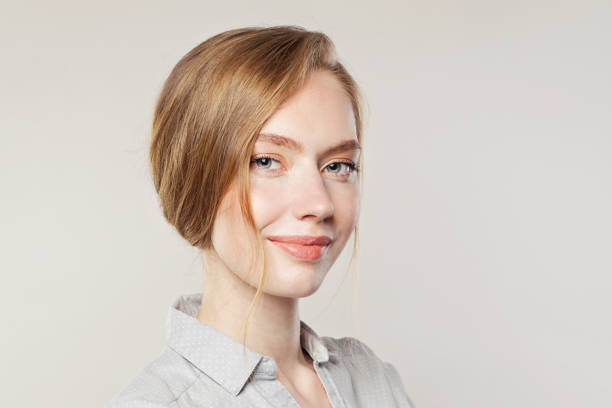 istock Cheerful young woman smiling on white banner background 1214634869