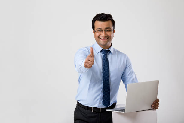 istock Happy businessman over white background 1214636172