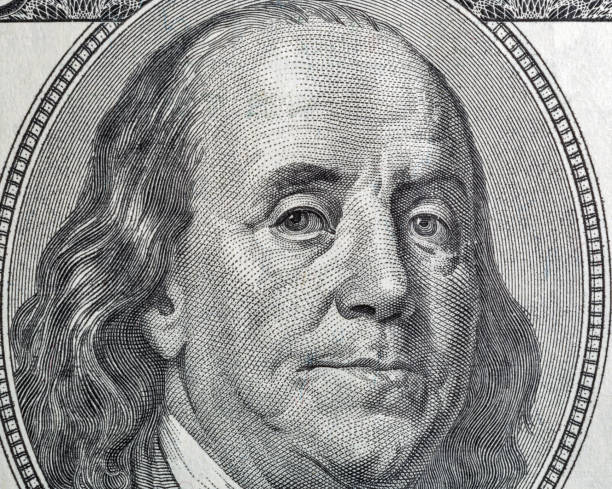 istock US President Benjamin Franklin portrait macro 1214636916