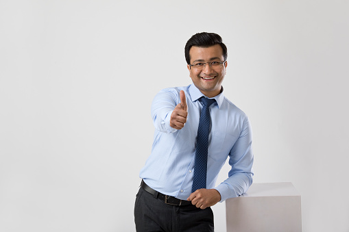 Happy businessman over white background