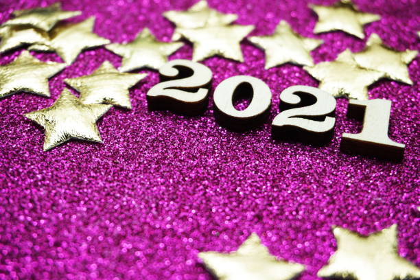 istock Happy New year 2021 with space copy on purple glitter background 1214640985