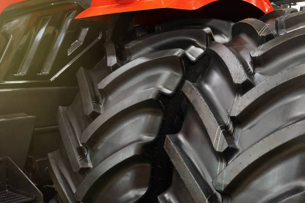 istock Closeup of big black rubber wheels 1214642029