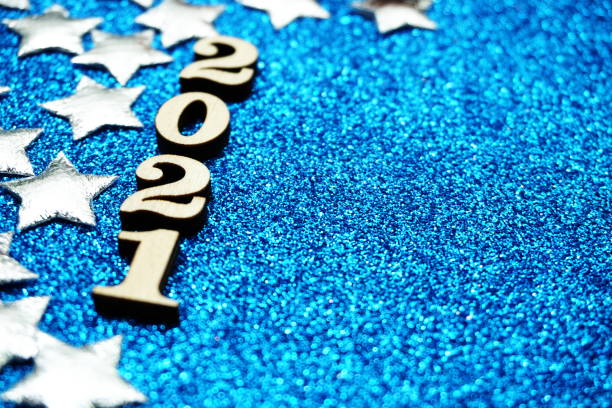istock Happy New year 2021 with space copy on blue glitter background 1214642207