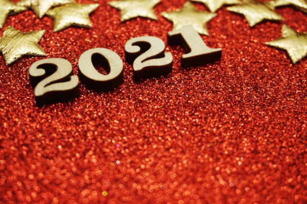 istock Happy New year 2021 with space copy on red glitter background 1214642362