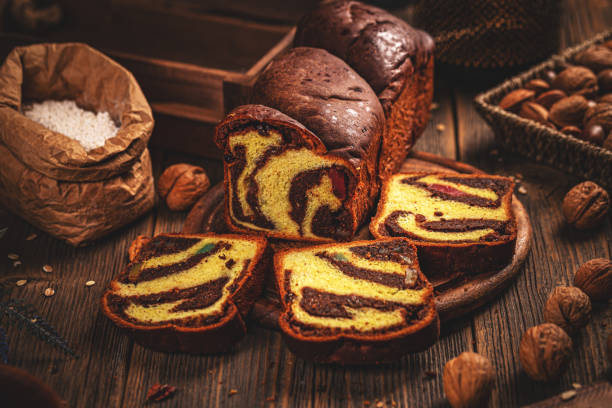 istock Whole and sliced sweet braided bread 1214646408