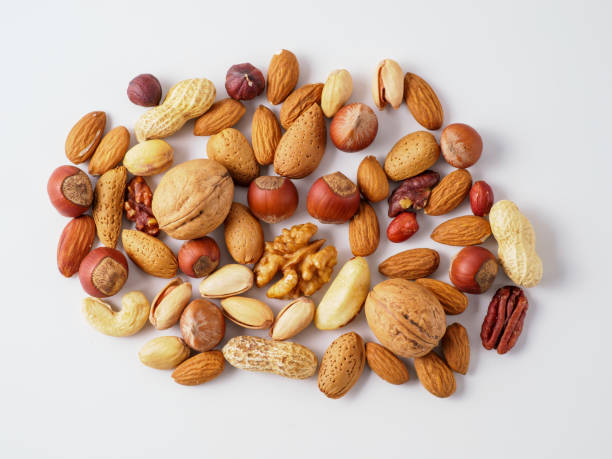 istock Mix of nuts isolated on white background. 1214652484