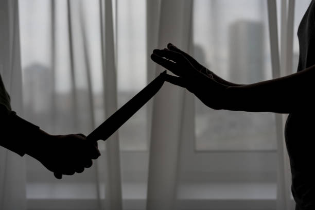 istock female hands stop an aggressive man 1214652743