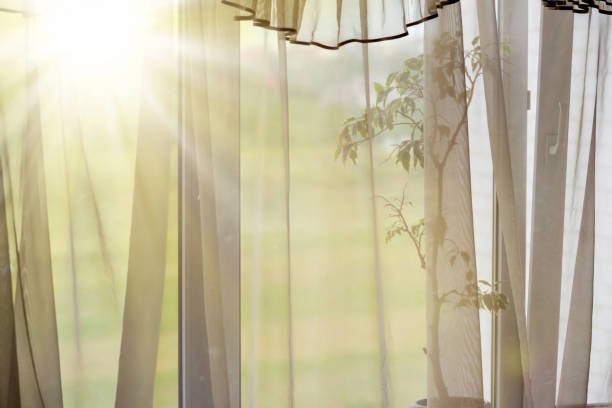 istock Sunlight through the window and the curtains 1214652800