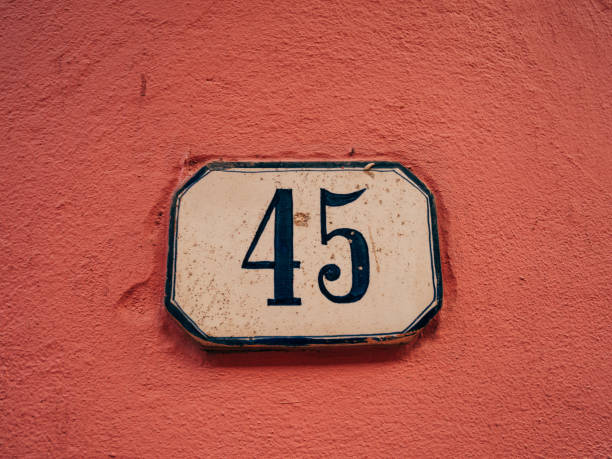 istock 45 number. Old plate on house. 1214652998