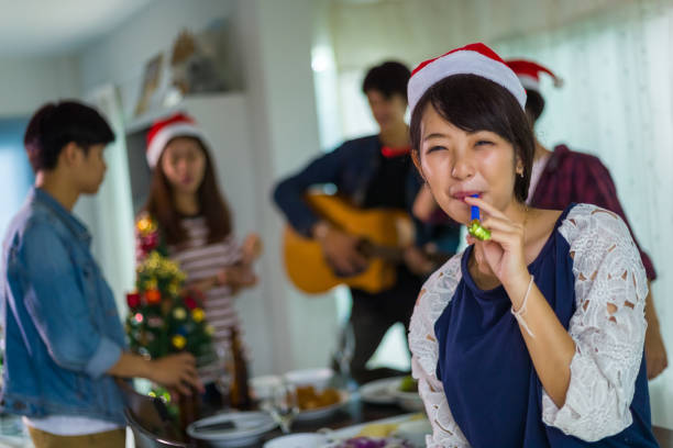 Group of teens asian is celebrate the christmas and happy new year party stock photo
