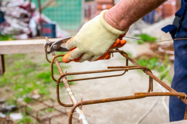 istock Construction worker binding rebar for reinforce concrete column at the building site. 1214655255