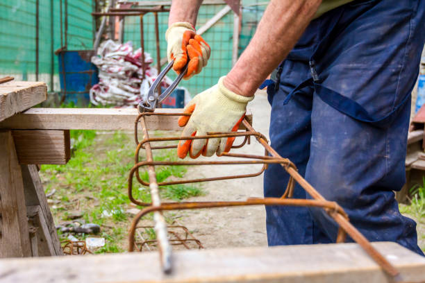 istock Construction worker binding rebar for reinforce concrete column at the building site. 1214655278
