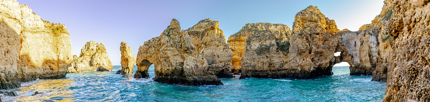 This pics shows beautiful ponta da piedade rocks at algarve coastline in portugal. Atlantic ocean and beautiful cliffs are seen in the pic and the pic is taken in January 2020.
